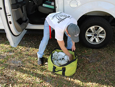 guy fixing sewer